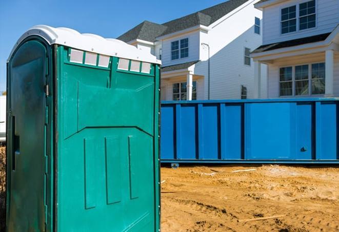 necessary construction site infrastructure multiple porta potties for workers